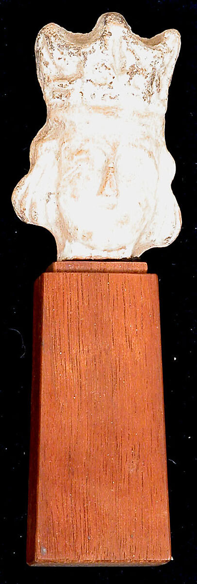 Head of a Figurine with an Elaborate Headdress, Earthenware; unglazed
