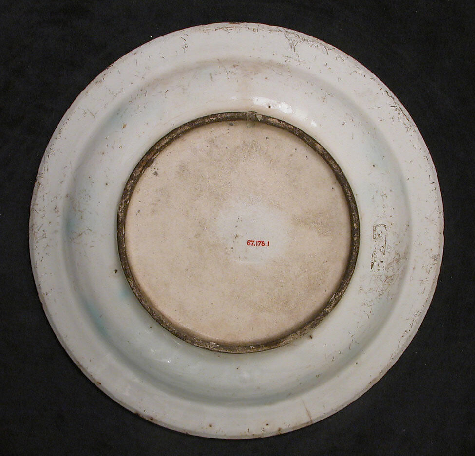 Plate Depicting a Woman Playing Tambourine, Stonepaste; polychrome painted under transparent glaze