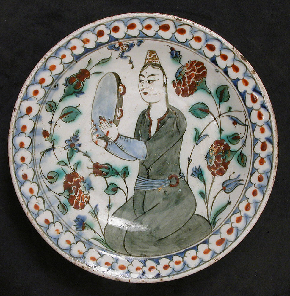 Plate Depicting a Woman Playing Tambourine, Stonepaste; polychrome painted under transparent glaze 