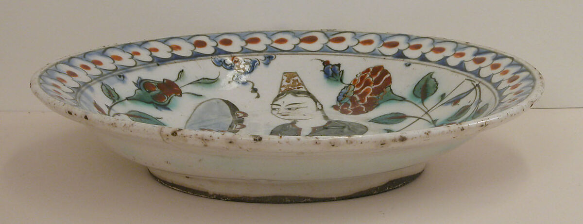 Plate Depicting a Woman Playing Tambourine, Stonepaste; polychrome painted under transparent glaze