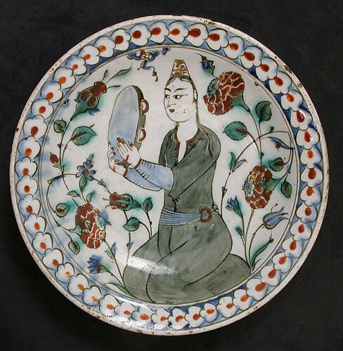 Plate Depicting a Woman Playing Tambourine