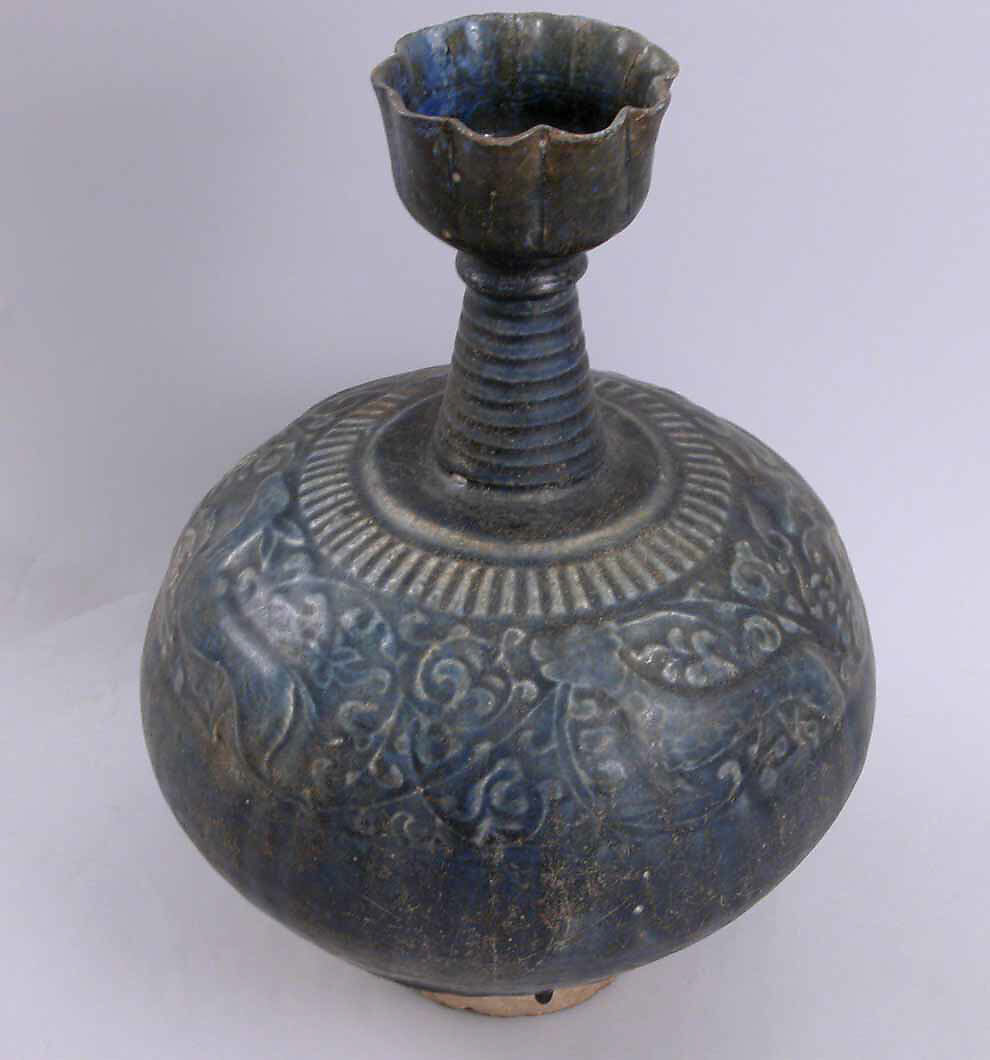 Bottle, Artificial paste; molded or carved and glazed