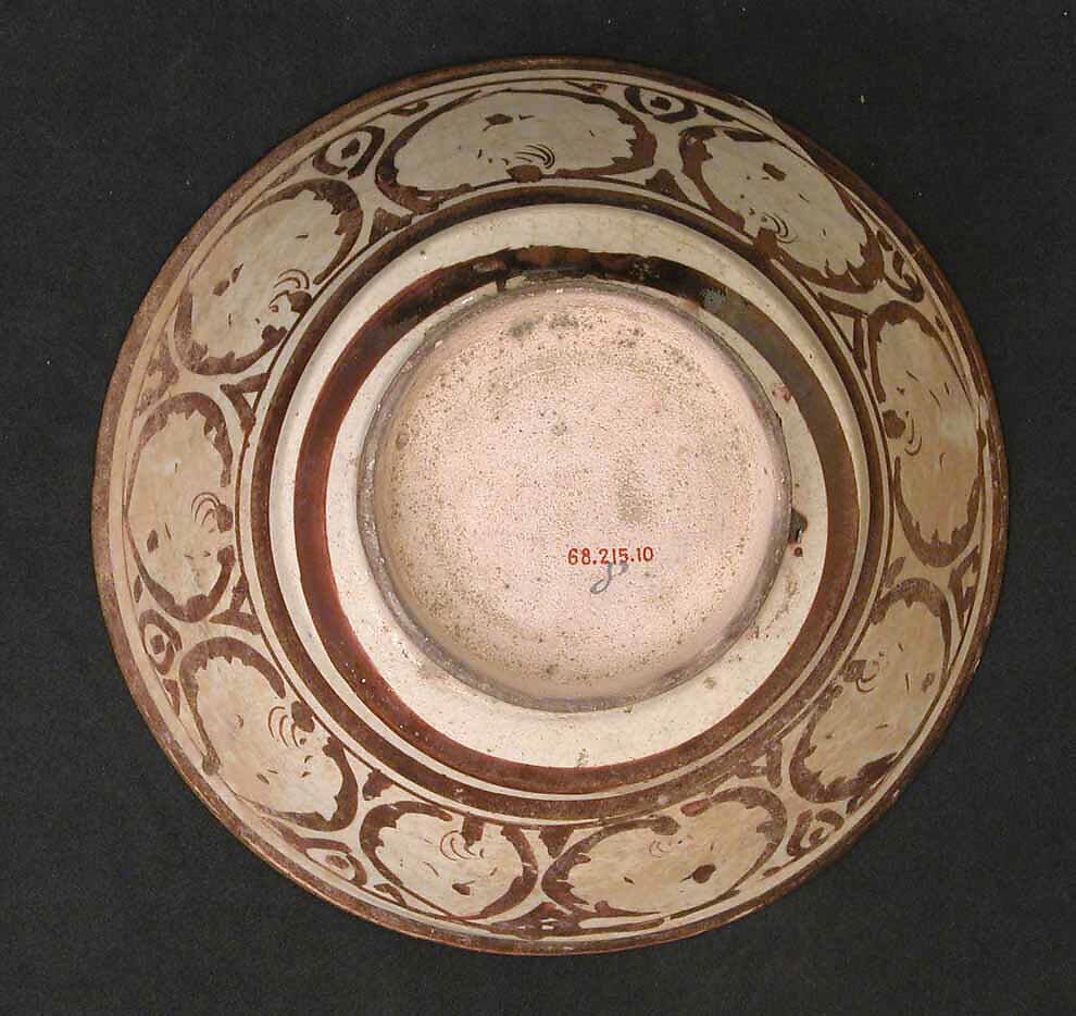 Bowl with Leopard, Stonepaste; luster-painted on opaque white glaze