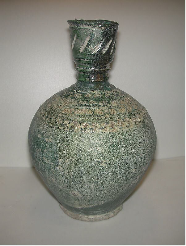 Bottle, Earthenware; incised and stamped decoration on white engobe under transparent glaze 