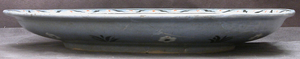 Blue-ground Dish with Floral and 'Cintamani' Designs, Stonepaste; colored slip and polychrome painted