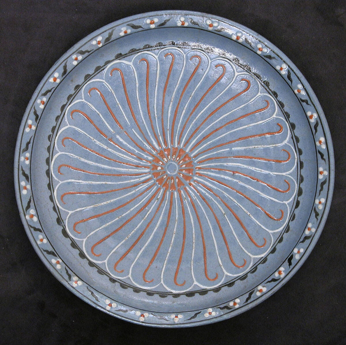 Blue-ground Dish with Floral and 'Cintamani' Designs, Stonepaste; colored slip and polychrome painted 