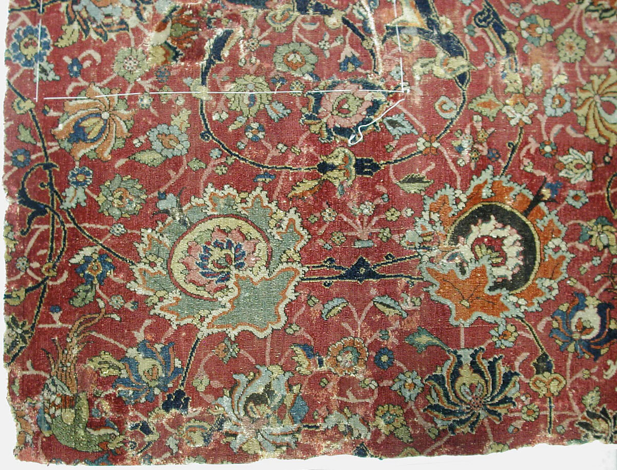 Fragment of a Carpet with Cartouche Border, Silk (warp and weft), wool (pile); asymmetrically knotted pile