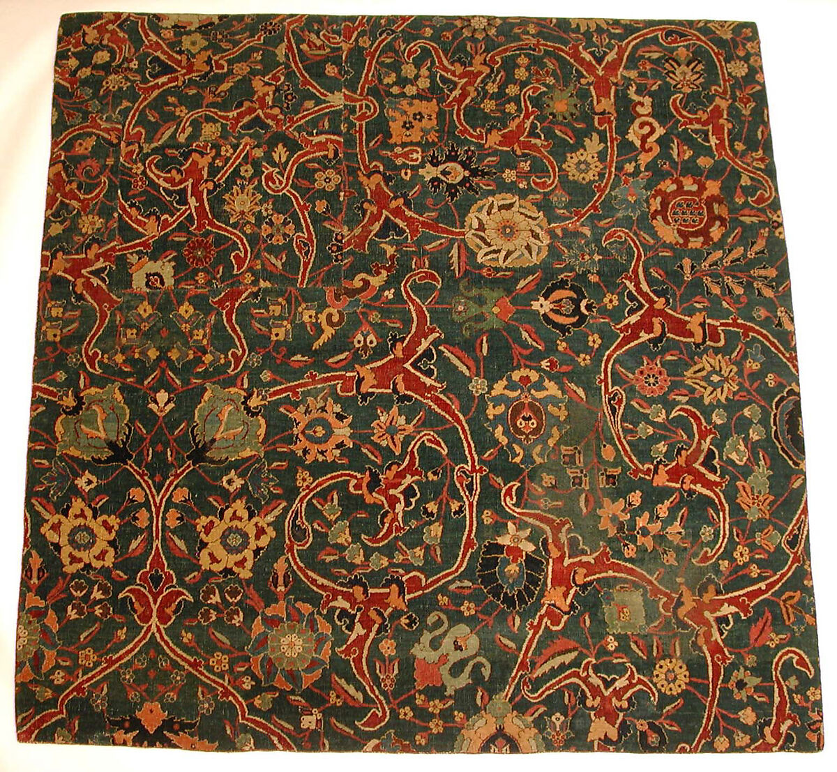 Blue-ground Carpet Fragment with Scrolling Floral Vines, Cotton (warp), wool (weft and pile); asymmetrically knotted pile