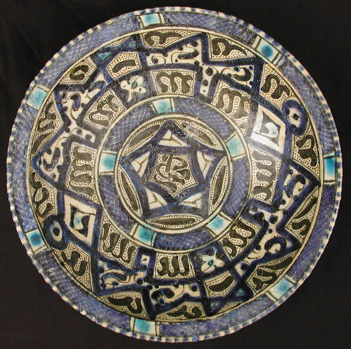 Bowl with Central Pentagon Motifs, Stonepaste; polychrome painted under transparent glaze 
