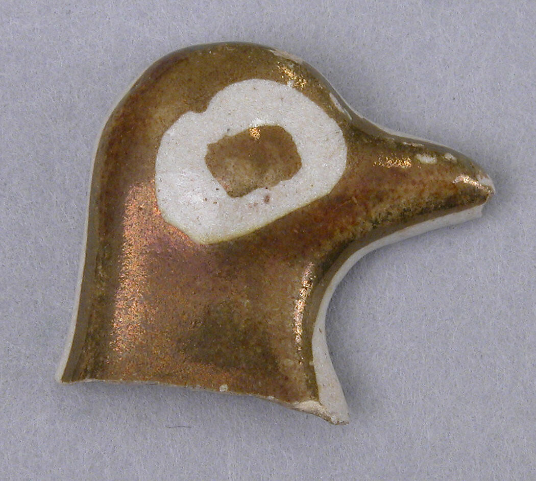 Fragment of a Luster Bird, Earthenware; luster-painted on opaque white glaze 