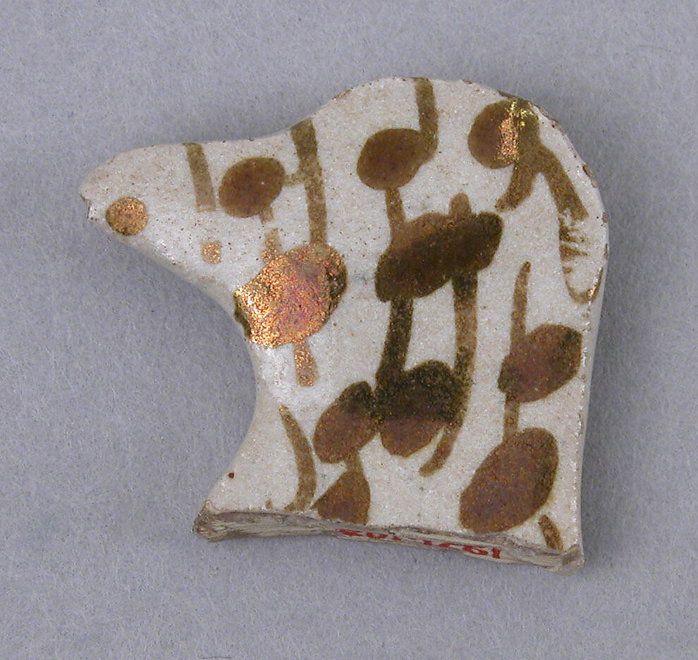Fragment of a Luster Bird, Earthenware; luster-painted on opaque white glaze