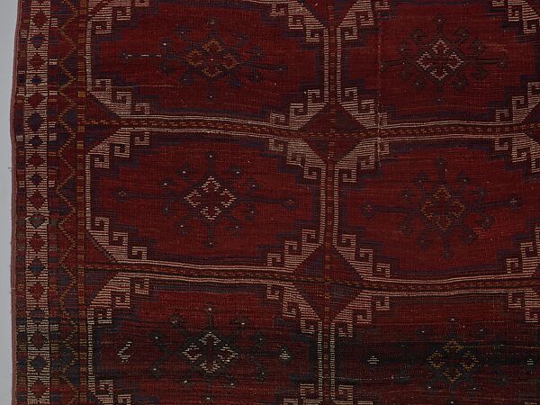 Carpet with Repeating Medallion Pattern on Red Background, Wool; (warp, weft, and pile); symmetrically knotted pile