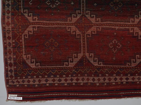 Carpet with Repeating Medallion Pattern on Red Background, Wool; (warp, weft, and pile); symmetrically knotted pile