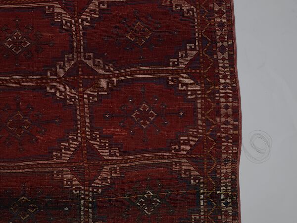 Carpet with Repeating Medallion Pattern on Red Background, Wool; (warp, weft, and pile); symmetrically knotted pile
