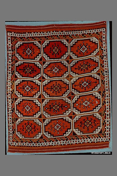 Carpet with Repeating Medallion Pattern on Red Background, Wool; (warp, weft, and pile); symmetrically knotted pile