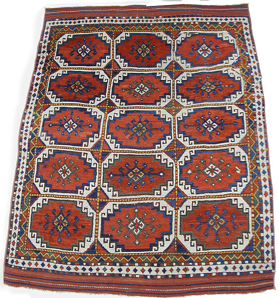 Carpet with Repeating Medallion Pattern on Red Background, Wool; (warp, weft, and pile); symmetrically knotted pile 