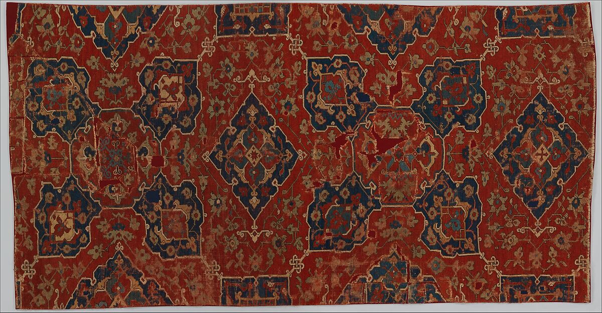 Fragment of a Carpet with Quatrefoil Design, Wool (warp, weft, and pile); symmetrically knotted pile 