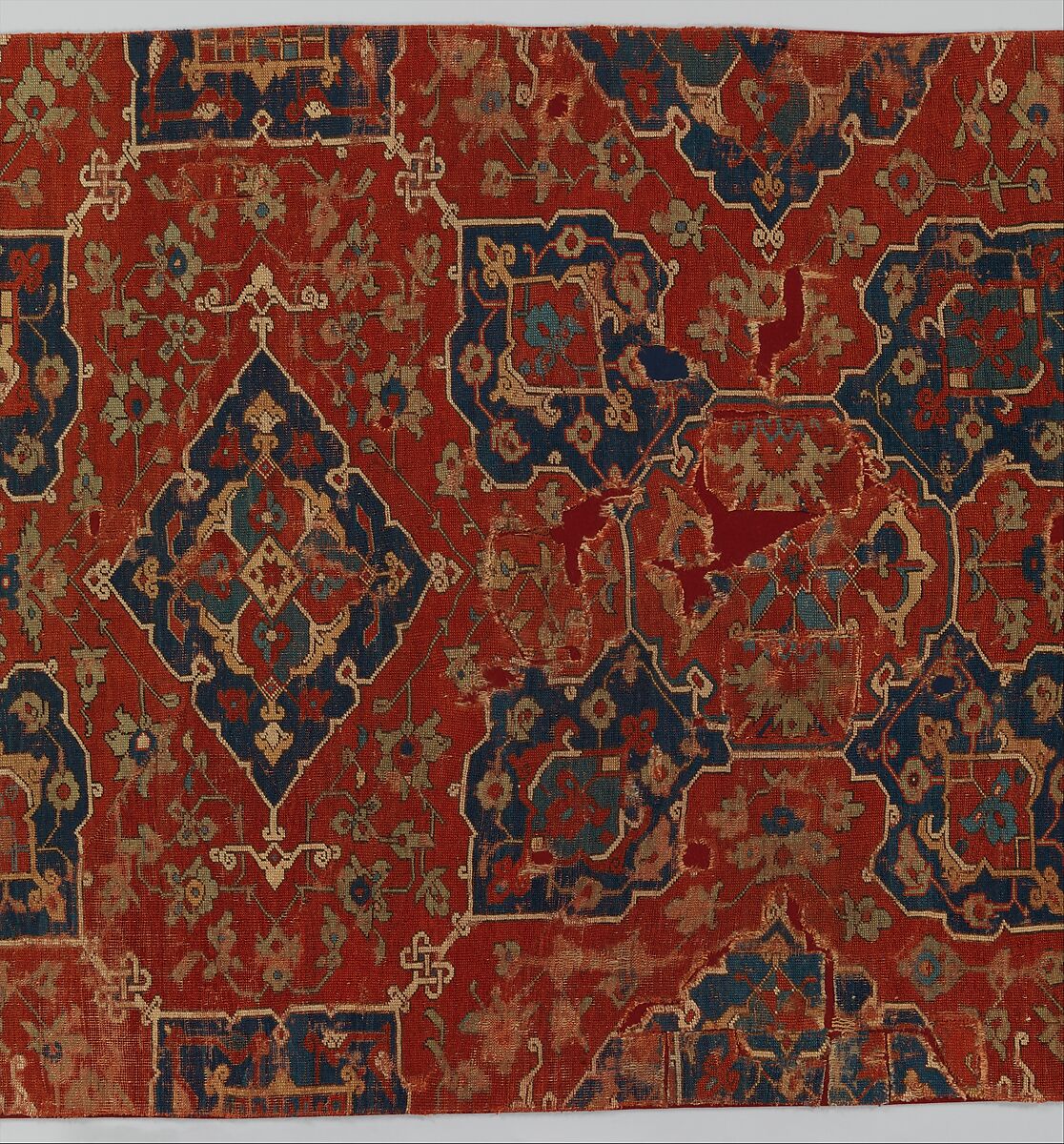 Fragment of a Carpet with Quatrefoil Design, Wool (warp, weft, and pile); symmetrically knotted pile