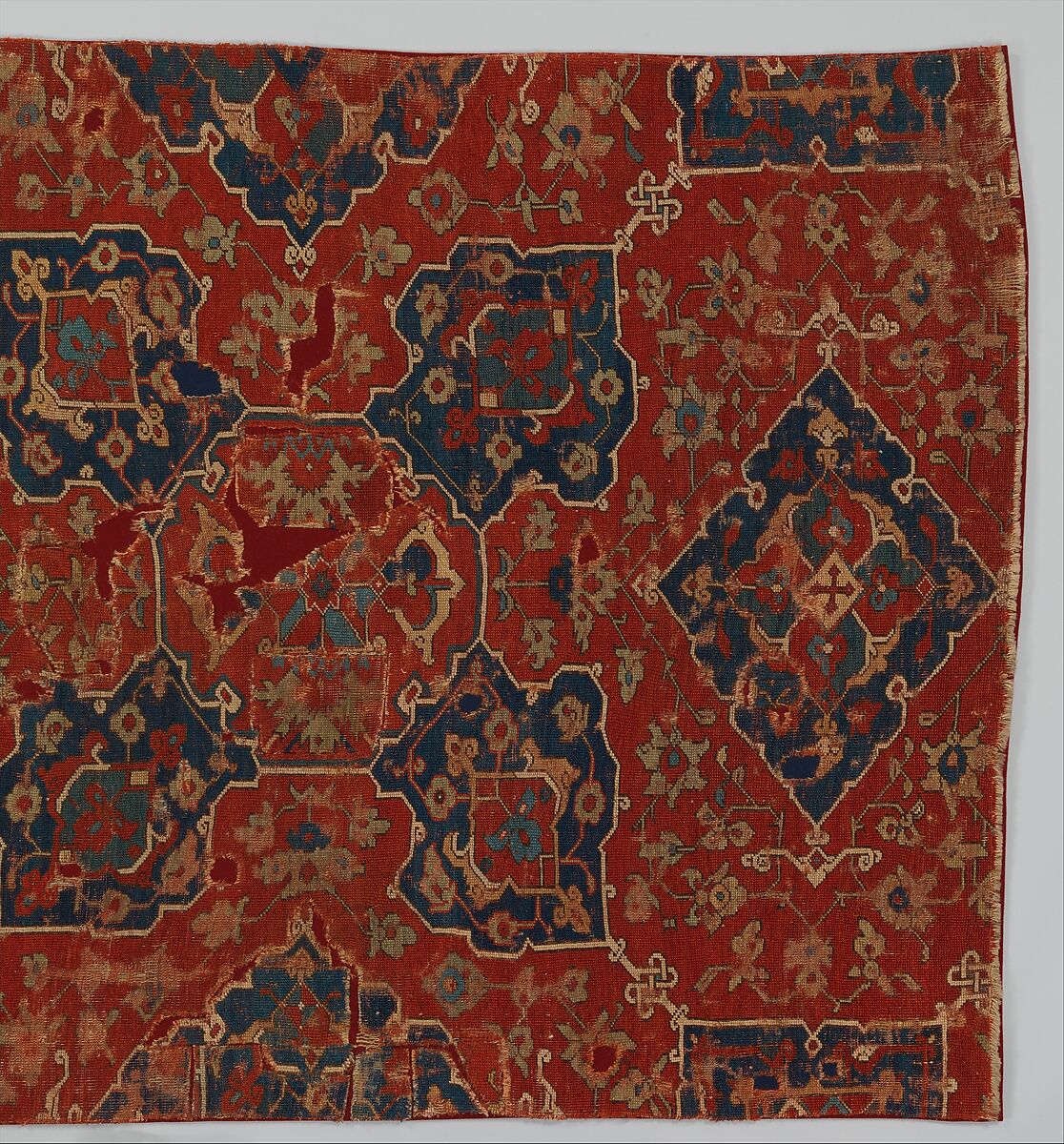 Fragment of a Carpet with Quatrefoil Design, Wool (warp, weft, and pile); symmetrically knotted pile