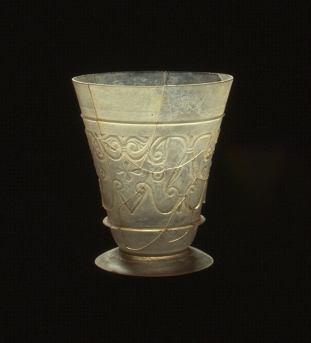 Beaker with Relief-cut Decoration, Glass, colorless; blown, cut