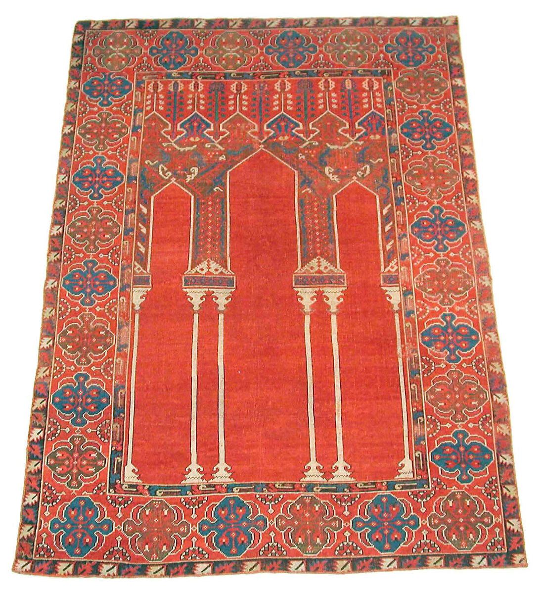 Prayer Rug with Triple Arch Design, Wool (warp, weft, and pile); symmetrically knotted pile 