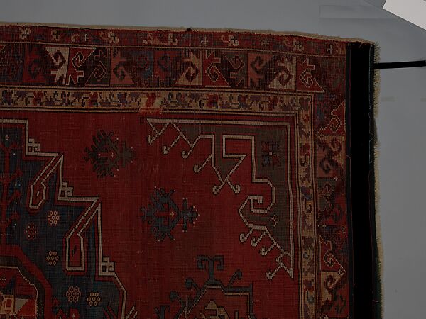 Tribal Carpet with Medallion Design, Wool (warp, weft, and pile); symmetrically knotted pile