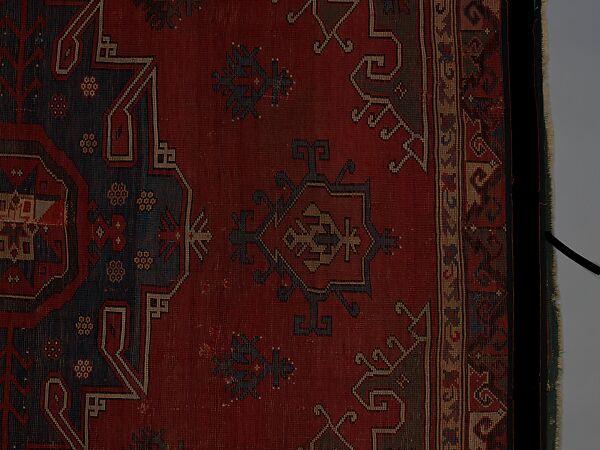 Tribal Carpet with Medallion Design, Wool (warp, weft, and pile); symmetrically knotted pile