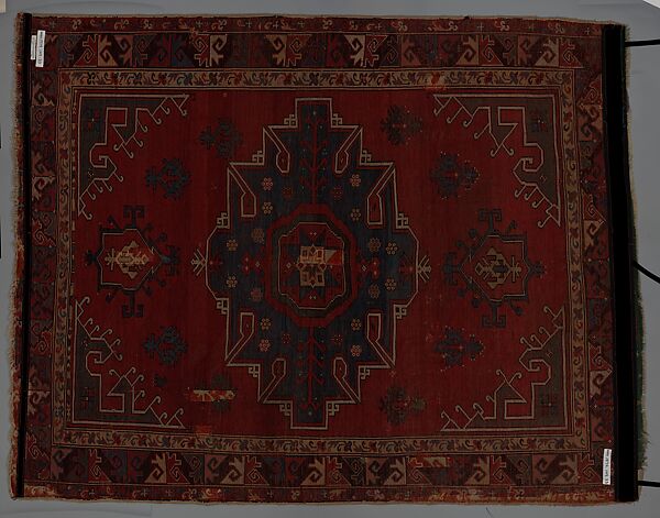 Tribal Carpet with Medallion Design, Wool (warp, weft, and pile); symmetrically knotted pile