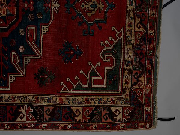 Tribal Carpet with Medallion Design, Wool (warp, weft, and pile); symmetrically knotted pile