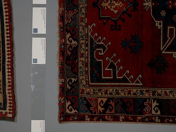Tribal Carpet with Medallion Design, Wool (warp, weft, and pile); symmetrically knotted pile