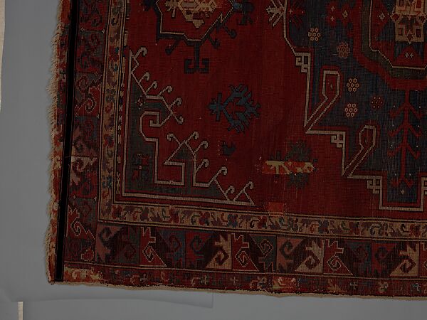 Tribal Carpet with Medallion Design, Wool (warp, weft, and pile); symmetrically knotted pile