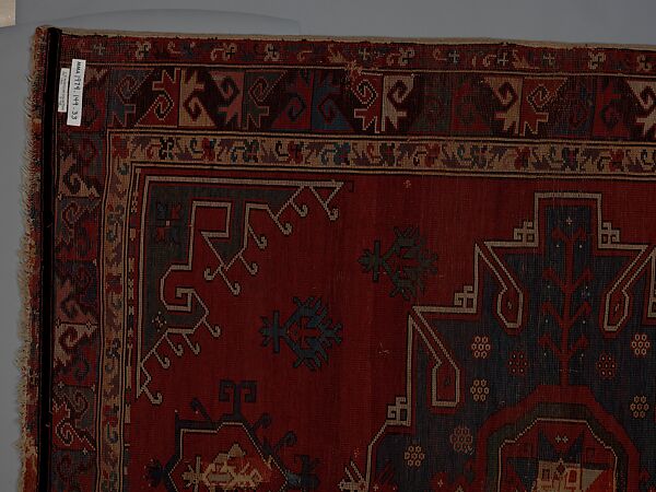 Tribal Carpet with Medallion Design, Wool (warp, weft, and pile); symmetrically knotted pile