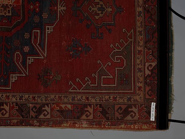 Tribal Carpet with Medallion Design, Wool (warp, weft, and pile); symmetrically knotted pile