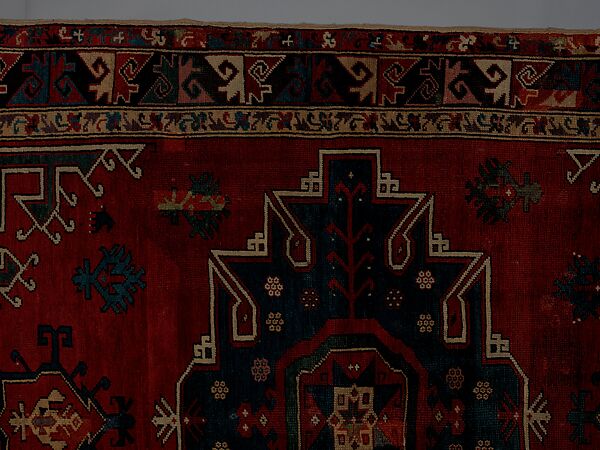 Tribal Carpet with Medallion Design, Wool (warp, weft, and pile); symmetrically knotted pile