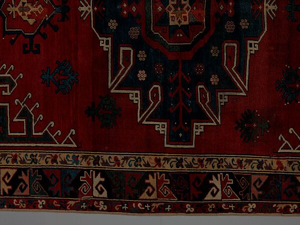 Tribal Carpet with Medallion Design, Wool (warp, weft, and pile); symmetrically knotted pile
