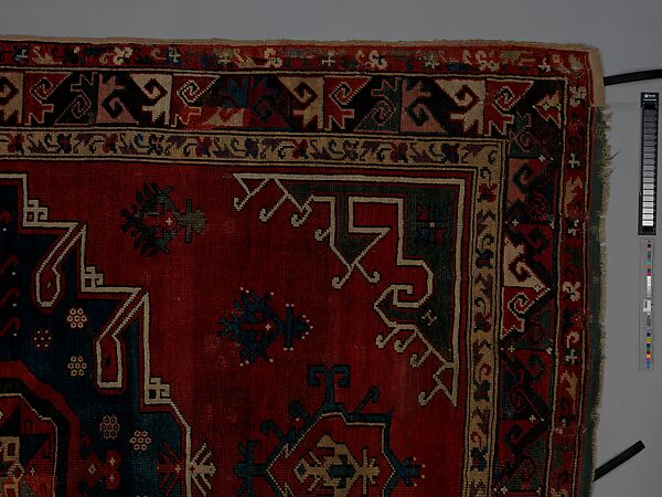 Tribal Carpet with Medallion Design, Wool (warp, weft, and pile); symmetrically knotted pile