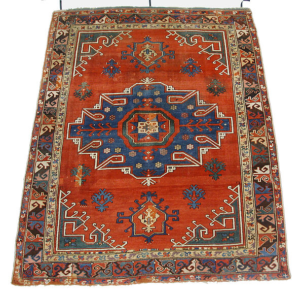 Tribal Carpet with Medallion Design, Wool (warp, weft, and pile); symmetrically knotted pile