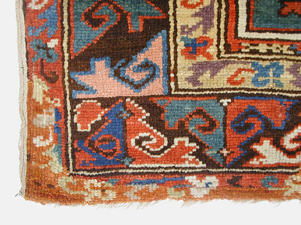 Tribal Carpet with Medallion Design, Wool (warp, weft, and pile); symmetrically knotted pile