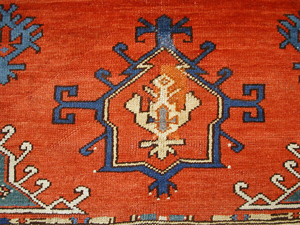 Tribal Carpet with Medallion Design, Wool (warp, weft, and pile); symmetrically knotted pile
