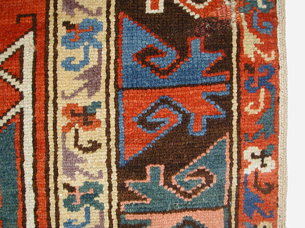 Tribal Carpet with Medallion Design, Wool (warp, weft, and pile); symmetrically knotted pile