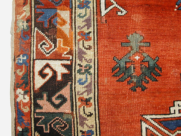 Tribal Carpet with Medallion Design, Wool (warp, weft, and pile); symmetrically knotted pile