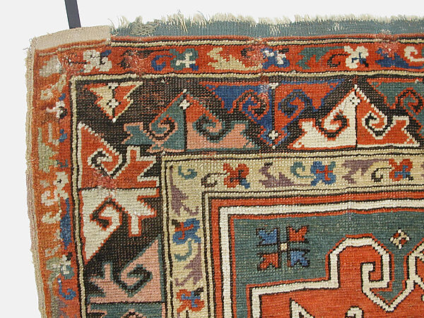 Tribal Carpet with Medallion Design, Wool (warp, weft, and pile); symmetrically knotted pile
