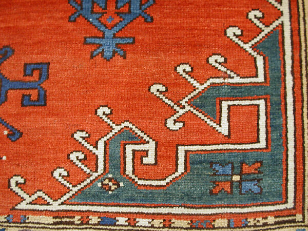 Tribal Carpet with Medallion Design, Wool (warp, weft, and pile); symmetrically knotted pile
