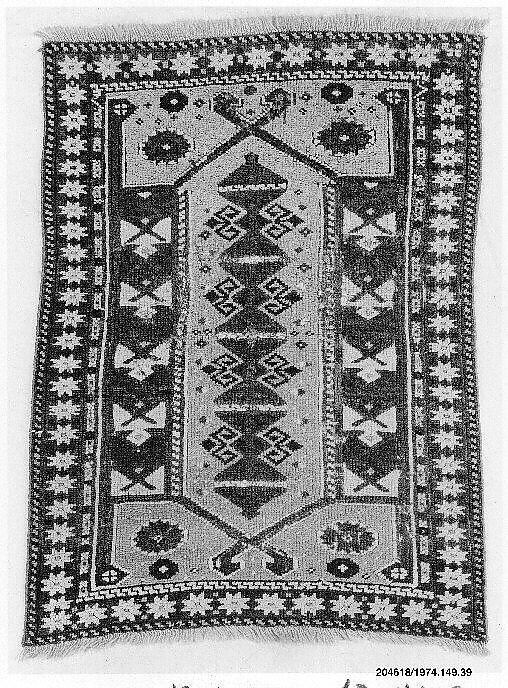 Carpet, Wool (warp, weft, and pile); symmetrically knotted pile