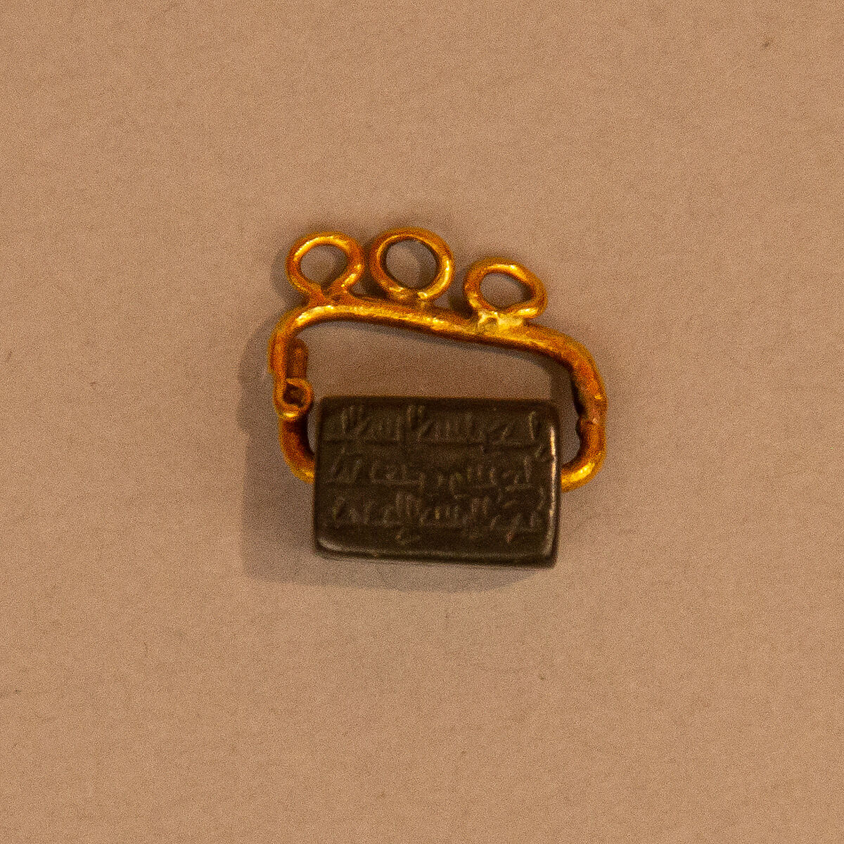 Seal Stone, Hematite; incised with gold fittings