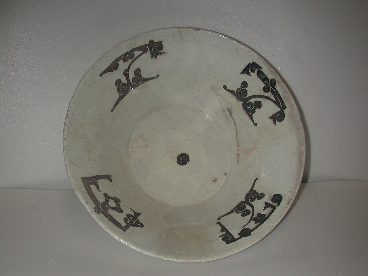 Bowl, Earthenware; white slip with incised black slip decoration under transparent glaze