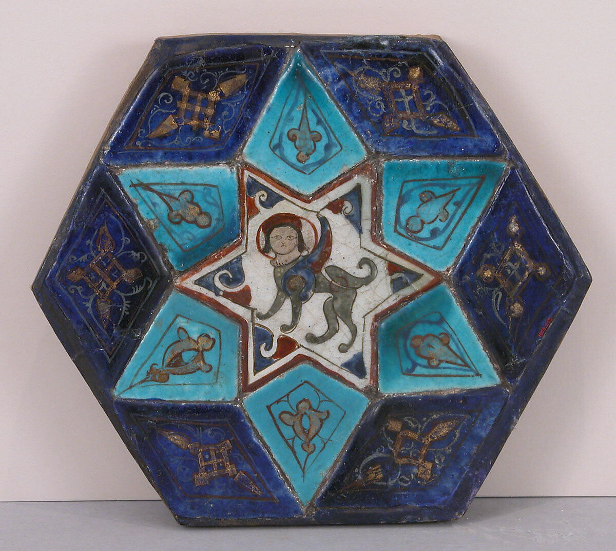 Hexagonal Tile Ensemble with Sphinx, Stonepaste; over- and underglaze-painted, gilded
