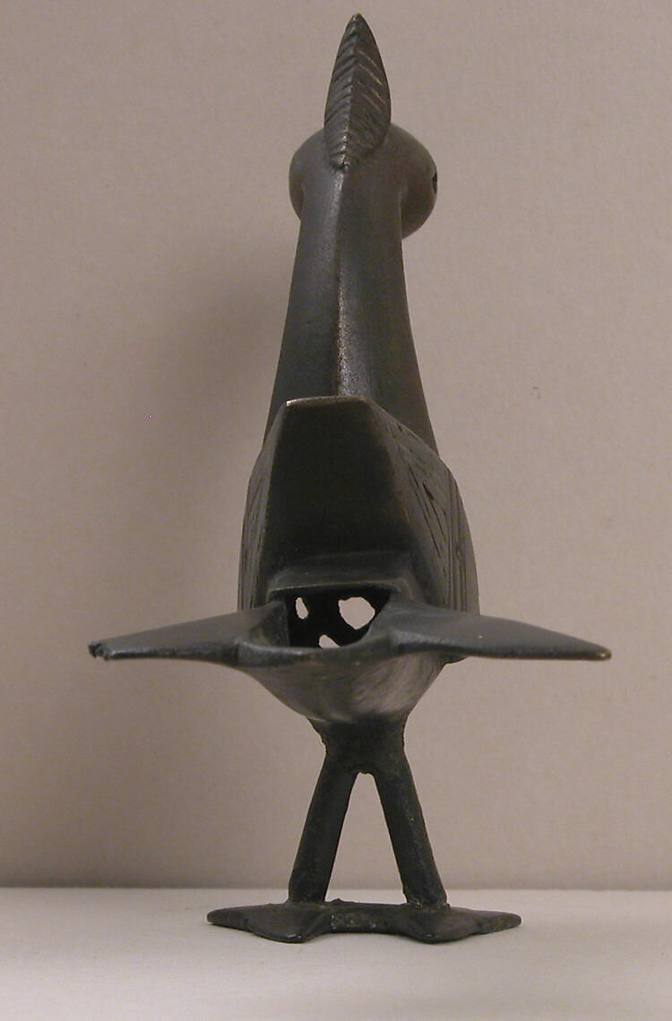 Ornament, Bronze; hollow cast, pierced, and incised