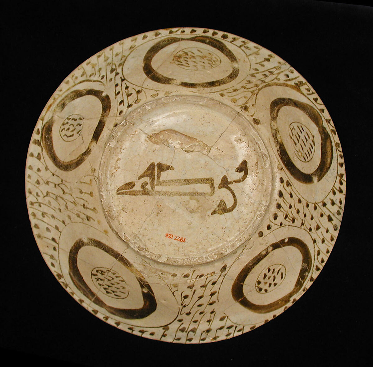 Bowl depicting a Man holding a Cup and a Flowering Branch, Earthenware; luster-painted on opaque white glaze