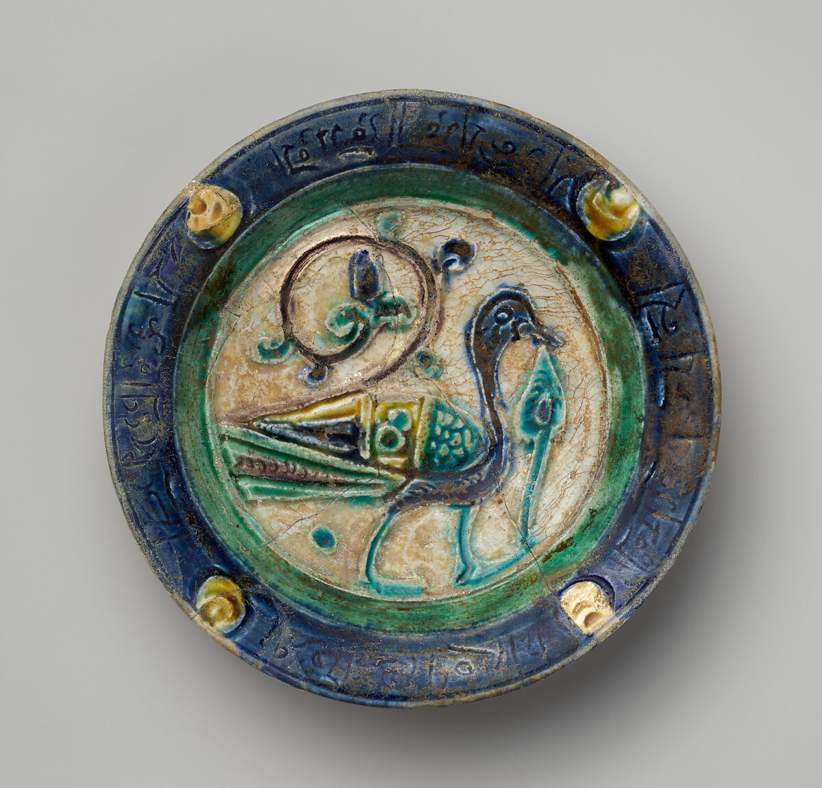 Dish, Stonepaste; carved, incised, polychrome painted under a transparent glaze (Laqabi ware) 